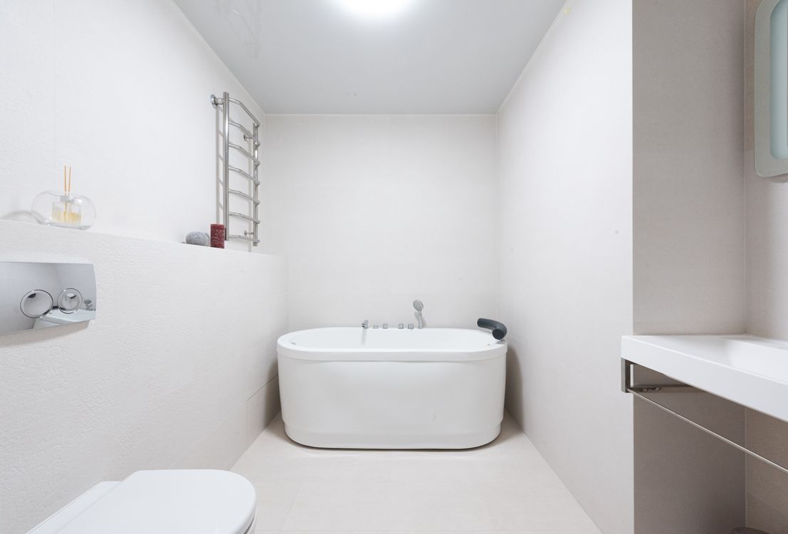 Bright white bathroom used to illustrate an imaginary roadside retreat